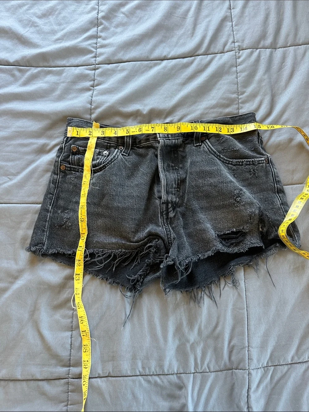 Levi’s Black Distressed Denim Cutoff Shorts